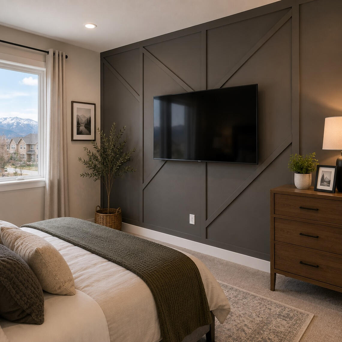 Modern Geometric Accent Wall in Charlotte NC Bedroom Dark gray geometric accent wall with mounted TV in modern bedroom Charlotte NC